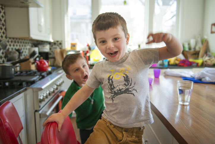 Kids playing in the kitchen Kids playing in the kitchen